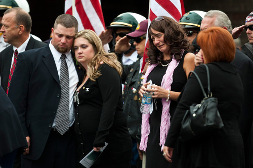 Chris Detrick  |  The Salt Lake Tribune &#xA;Siblings Jason and Cassie Wagstaff, left, widow Tiffany Wagstaff, center, and father and mother Ron and Suzanne Wagstaff, right, grieve after the funeral service for U.S. Army Blackhawk helicopter pilot Matthew G. Wagstaff at Jenkins - Soffe Funeral Homes & Cremation Center Tuesday October 5, 2010.  Wagstaff, a 10-year veteran of the Army's 101st Airborne Division, died in a Sept. 21 helicopter crash in Afghanistan. It was his second deployment to Afghanistan. He also had served in Iraq.