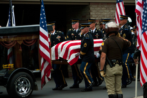 Chris Detrick  |  The Salt Lake Tribune &#xA;Members of the Utah National Guard Honor Guard carry out the casket after the funeral service for U.S. Army Blackhawk helicopter pilot Matthew G. Wagstaff at Jenkins - Soffe Funeral Homes & Cremation Center Tuesday October 5, 2010.  Wagstaff, a 10-year veteran of the Army's 101st Airborne Division, died in a Sept. 21 helicopter crash in Afghanistan. It was his second deployment to Afghanistan. He also had served in Iraq.