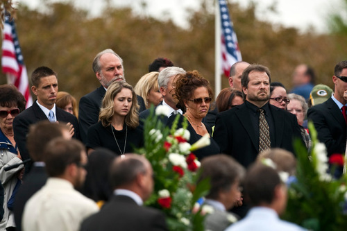 Chris Detrick  |  The Salt Lake Tribune &#xA;Friends and family members listen during the burial of U.S. Army Blackhawk helicopter pilot Matthew G. Wagstaff at the Utah Veterans Memorial Park Tuesday October 5, 2010.  Wagstaff, a 10-year veteran of the Army's 101st Airborne Division, died in a Sept. 21 helicopter crash in Afghanistan. It was his second deployment to Afghanistan. He also had served in Iraq.