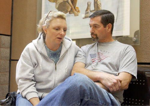 Christopher Dane Zdunich's mother Leslie Broderick, left, and step-father Tim Broderick speak with The Tribune at a Las Vegas hospital Wednesday, Oct. 6, 2010. Alex Lambson, 17, and Christopher Dane Zdunich, 16, were struck by lightning outside their school Oct. 6 in St. George. (Isaac Brekken for the Salt Lake Tribune)