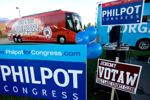 Djamila Grossman  |  The Salt Lake Tribune&#xA;&#xA;A view of the Fire Pelosi Bus, along with campaign signs for Morgan Philpot and Jeremy Votaw in Sandy, Saturday, Oct. 9, 2010.