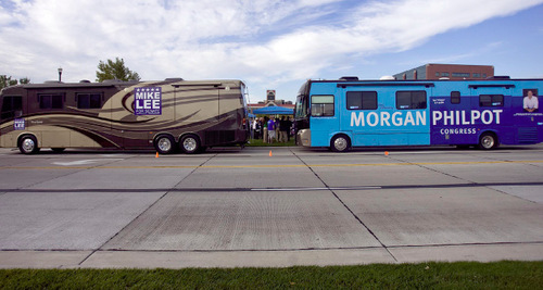 Djamila Grossman  |  The Salt Lake Tribune&#xA;&#xA;A view of the campaign buses for republicans Morgan Philpot and Mike Lee who made an appearance coinciding with a stop of the Fire Pelosi Bus Tour in Sandy, Saturday, Oct. 9, 2010.