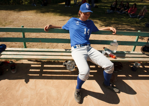 Leah Hogsten  |  The Salt Lake Tribune 
14- Zack Welch, above,  played his first game of the season during the last season game and scored a run for the team. The Salt Lake Lutheran baseball team during their last game of the season Friday, October 1, 2010, in SLC at Lindsay Gardens. The Salt Lake Lutheran baseball team, a collection of rookies that make up a varsity squad, has struggled in another lousy season. In their opener against Tabiona, the Lynx lost 39-2. But this is a team of kids who play baseball merely so there could be a baseball team at Salt Lake Lutheran.