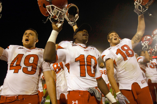Chris Detrick  |  The Salt Lake Tribune &#xA;Utah Utes defensive end Trevor Reilly, No. 49, wide receiver DeVonte Christopher, No. 10, and linebacker Chad Manis, No. 18, celebrate after beating Iowa State on Oct. 9. The Utes are undefeated at 5-0.