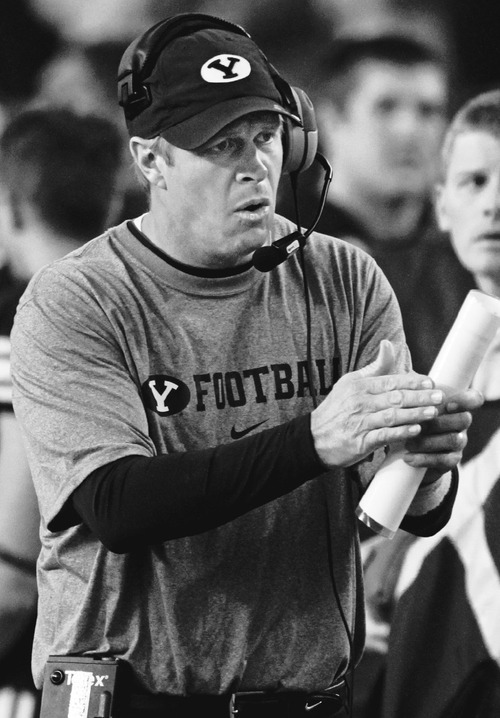 Rick Egan   |  The Salt Lake Tribune

Head coach Bronco Mendenhall  coaches the defense, in football action, BYU vs. San Diego State, at Lavell Edwards Stadium in Provo,  Saturday, October 9, 2010