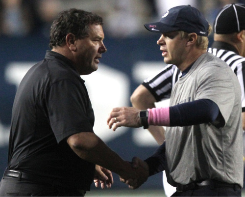 Rick Egan   |  The Salt Lake Tribune&#xA;&#xA;BYU head coach Bronco Mendenhall meets with Aztec coach, Brady Hoke  after the BYU vs. San Diego State, game at Lavell Edwards Stadium in Provo,  Saturday, October 9, 2010