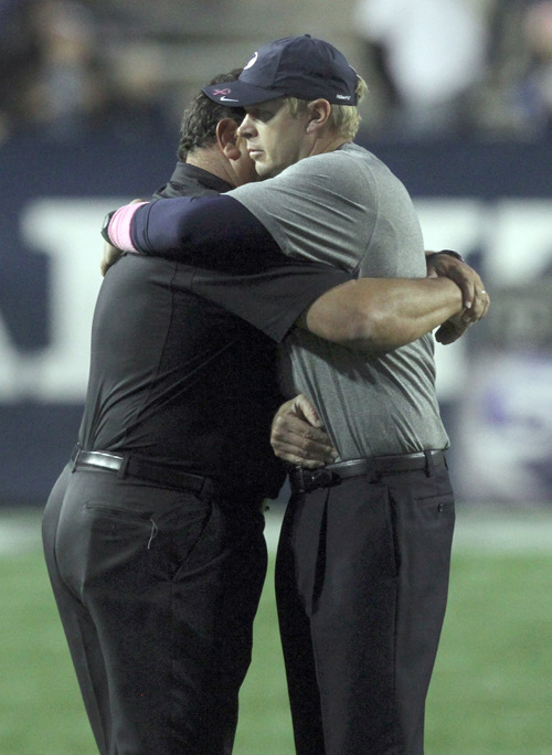 Rick Egan   |  The Salt Lake Tribune&#xA;&#xA;BYU head coach Bronco Mendenhall meets with Aztec coach, Brady Hoke  after the BYU vs. San Diego State, game at Lavell Edwards Stadium in Provo,  Saturday, October 9, 2010