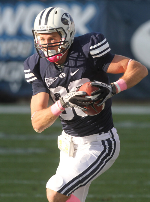 Rick Egan   |  The Salt Lake Tribune&#xA;&#xA;Marcu Mathews, runs for the Cougars,  but later fumbles the ball, and the Aztec's recovered, in football action, BYU vs. San Diego State, at Lavell Edwards Stadium in Provo,  Saturday, October 9, 2010  Brandon Davis (11) defends for the Aztecs.