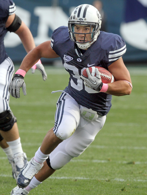 Rick Egan   |  The Salt Lake Tribune&#xA;&#xA;Brayan Kiraya, runs for the Cougars,  in football action, BYU vs. San Diego State, at Lavell Edwards Stadium in Provo,  Saturday, October 9, 2010