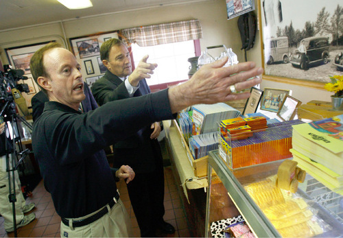 Francisco Kjolseth  |  The Salt Lake Tribune&#xA;Kent Winder of Winder Dairy, left, one of Utah's oldest companies and longtime milk provider gives Governor Gary Herbert a tour of the country strore and the history on display as they celebrate 130 years in business.&#xA;West Valley City, Oct. 11, 2010.