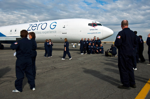 Chris Detrick  |  The Salt Lake Tribune &#xA;Middle School math and science teachers pose for a picture before boarding modified Boeing 727 during the Northrop Grumman Foundation Weightless Flights of Discovery zero-gravity flight Monday October 11, 2010.  While on the Boeing 727, parabolic arcs are performed to create a weightless environment inside of the airplane.  Each weightless session lasts approximately 25 seconds.