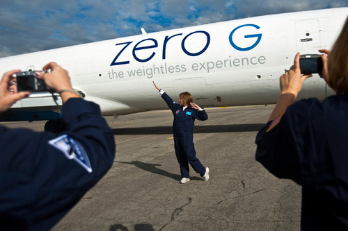 Chris Detrick  |  The Salt Lake Tribune &#xA;Bonita Richins. a teacher at North Cache 8-9 Center in Richmond, poses for a picture before boarding modified Boeing 727 during the Northrop Grumman Foundation Weightless Flights of Discovery zero-gravity flight Monday October 11, 2010.  While on the Boeing 727, parabolic arcs are performed to create a weightless environment inside of the airplane.  Each weightless session lasts approximately 25 seconds.