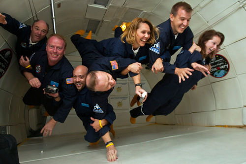 Chris Detrick  |  The Salt Lake Tribune 
Middle School math and science teachers float around weightless inside of a modified Boeing 727 during the Northrop Grumman Foundation Weightless Flights of Discovery zero-gravity flight Monday October 11, 2010.  While on the Boeing 727, parabolic arcs are performed to create a weightless environment inside of the airplane.  Each weightless session lasts approximately 25 seconds.