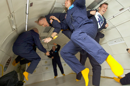 Chris Detrick  |  The Salt Lake Tribune &#xA;(L-R) Benjamin Bedell, Gilbert (AZ) Junior High School, Kit&#x9;Workman, Clearfield High School, Bonnie Bourgeous, Clearfield High School, and Justin Frost, Syracuse, float around weightless inside of a modified Boeing 727 during the Northrop Grumman Foundation Weightless Flights of Discovery zero-gravity flight Monday October 11, 2010.  While on the Boeing 727, parabolic arcs are performed to create a weightless environment inside of the airplane.  Each weightless session lasts approximately 25 seconds.
