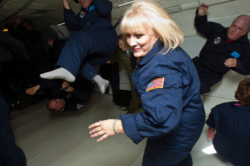 Chris Detrick  |  The Salt Lake Tribune &#xA;Sherrie Quilter, center, a teacher at Farmington Bay YIC in Farmington, floats around weightless inside of a modified Boeing 727 during the Northrop Grumman Foundation Weightless Flights of Discovery zero-gravity flight Monday October 11, 2010.  While on the Boeing 727, parabolic arcs are performed to create a weightless environment inside of the airplane.  Each weightless session lasts approximately 25 seconds.