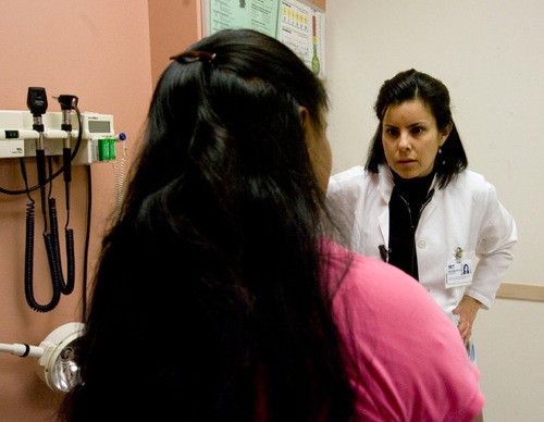 Steve Griffin  |  The Salt Lake Tribune&#xA;&#xA;When a West Valley City women's clinic closed last month amid allegations of Medicaid fraud, as many as 500, uninsured expectant mothers found themselves without a medical home. Here physician assistant Martha Mandujano, of Community Health Centers Inc, cares for one of those women during a prenatal visit at the Taylorsville clinic Monday, October 11, 2010. Community Health Centers Inc. and many other clinics and hospitals will be providing care for the women.