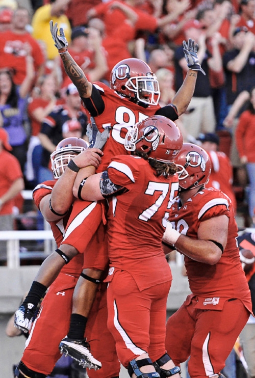 Michael Mangum  |  The Salt Lake Tribune

Utah wide receiver Jereme Brooks (85) celebrates with his team after his touchdown in the first half as Utah hosted Pitt at Rice-Eccles Stadium in Salt Lake City on Thursday, Sept.2, 2010. The Utes went on to win in overtime 27-24.