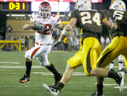Scott Sommerdorf  l  The Salt Lake Tribune&#xA;Utah Utes running back Sausan Shakerin (22) looks for an opening at the goal line late in the game. He was stopped, and later the Cowboys stopped Shakerin on a fourth down play at the Wyoming two. The Utah Utes beat Wyoming 30-6, Saturday 10/16/2010.