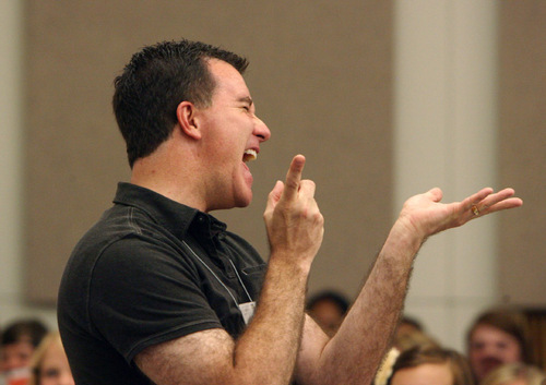 Steve Griffin  |  The Salt Lake Tribune&#xA;&#xA;  Brady Allred hits a high note during his high school student choral summer camp during a mass rehearsal at Gardener Hall on the campus of the University of Utah in Salt Lake City on Thursday, August 12, 2010.