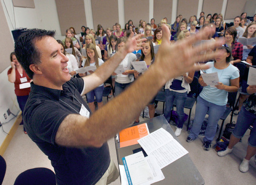 Steve Griffin  |  The Salt Lake Tribune

 Brady Allred sings  leads the high school students enrolled in his choral summer  camp  during a mass rehearsal at Gardener Hall in the Campus of the University of Utah in Salt Lake City on Thursday, August 12, 2010.