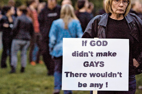 Djamila Grossman  |  The Salt Lake Tribune&#xA;&#xA;Karen Evans holds a sign during a rally near Temple Square in Salt Lake City, Thursday, Oct. 7, 2010. Supporters of the lesbian, gay, bisexual and transgender (LGBT) community protested recent remarks by LDS apostle Boyd K. Packer that same-sex attraction is 