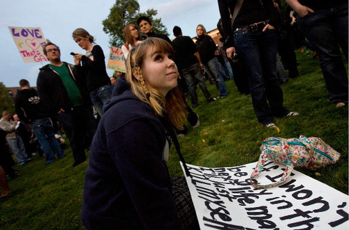 Djamila Grossman  |  The Salt Lake Tribune&#xA;&#xA;Megan Hoefflin looks up, as she joins supporters of the lesbian, gay, bisexual and transgender (LGBT) community during a protest over recent remarks by LDS apostle Boyd K. Packer that same-sex attraction is 