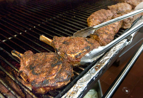 Paul Fraughton  |  The Salt Lake Tribune    Steaks on the grill at Ruth's Chris in downtown Salt Lake City.