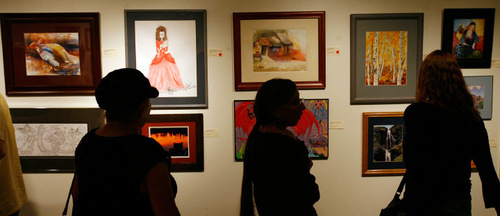 Steve Griffin  |  The Salt Lake Tribune&#xA;&#xA;Artwork hangs on he wall at the Patrick Moore Gallery as part of the 5th annual 