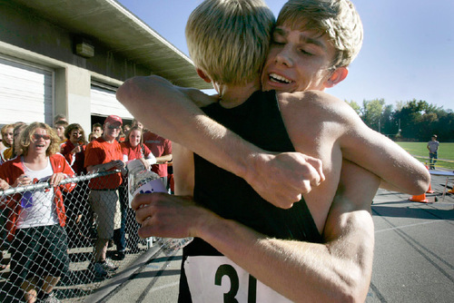 Djamila Grossman  |  The Salt Lake Tribune&#xA;&#xA;American Fork High School's Clayton Young, 32, hugs teammate Austin West, 31, after Young won the 5A boys race at the 2010 Utah UHSAA State Cross Country Championships at Sugarhouse Park in Salt Lake City, Wednesday, Oct., 20, 2010.