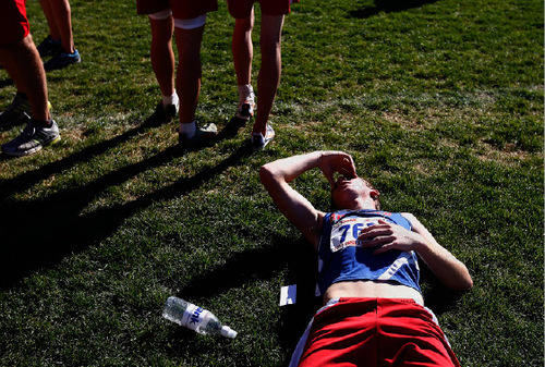 Djamila Grossman  |  The Salt Lake Tribune&#xA;&#xA;Richfield High School's Tyrone Hink, 763, lays in the grass after the 3A boys race at the 2010 Utah UHSAA State Cross Country Championships at Sugarhouse Park in Salt Lake City, Wednesday, Oct., 20, 2010.