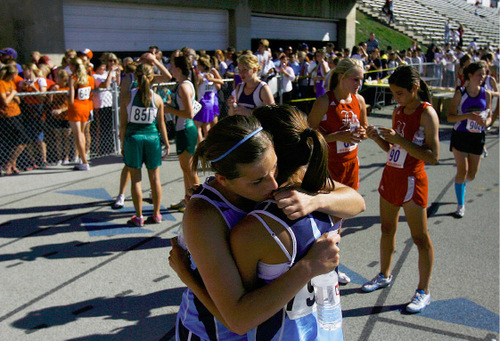 Djamila Grossman  |  The Salt Lake Tribune&#xA;&#xA;Salem Hill High School's Sierra Malm, 795, and Kaetlin Bracken, 790, hug after the 4A girls race at the 2010 Utah UHSAA State Cross Country Championships at Sugarhouse Park in Salt Lake City, Wednesday, Oct., 20, 2010.