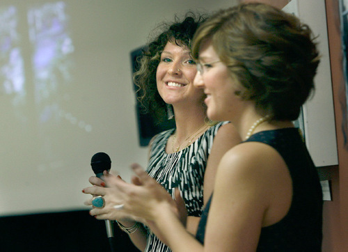 Scott Sommerdorf  l  The Salt Lake Tribune
Sisters Liz (left) and Sarah Coleman - both survivors of sexual violence - have put together an art project aimed at giving victims a voice. The installation features visual art and audio recordings of survivor's stories, and will be at the Sorenson Unity Center through December.