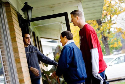 Djamila Grossman  |  The Salt Lake Tribune&#xA;&#xA;Utah Gov. Gary Herbert and Shawn Bradley talk to Russell Butterfield and his family while going door to door in Murray to help Bradley who is running for a seat the Utah House of Representatives, Saturday, Oct. 23, 2010. &#xA;