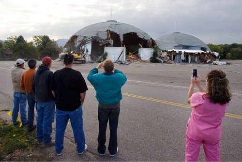 Steve Griffin  |  The Salt Lake Tribune&#xA;&#xA; Onlookers record the demolition of the Cinedome 70 in Riverdale, by Sahara Construction of Bountiful, on  Monday, Oct. 18, 2010.