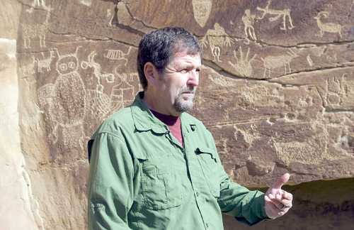 Al Hartmann  |  The Salt Lake Tribune 
Jerry Spangler of the Colorado Plateau Archaelogical Alliance describes one of the better panels of rock art in Nine Mile Canyon.  It's called the Owl panel. Bill Barrett Corp. operates many gas wells in the area and has agreed to fund cultural resources field work, monitoring, rock art conservation and mitigation plans.