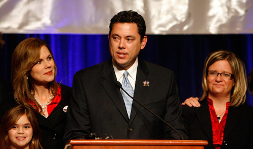 Newly elected congressman Jason Chaffetz is flanked by wife Julie and daughter Kate, 7, left, and campaign manager Jennifer Scott, right, as he addresses  supporters during election night celebrations at the Utah Republican Party headquarters at the Grand America Hotel in Salt Lake City on Tuesday,  November 4, 2008.  Steve Griffin/The Salt Lake Tribune
