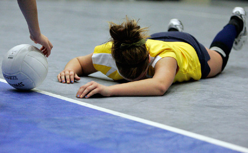 Djamila Grossman  |  The Salt Lake Tribune&#xA;&#xA;Enterprise High School's Riley Hutchings lays on the ground after missing a ball during a game against San Juan High School in the 2A championship game at Utah Valley University in Orem, Saturday, October 30, 2010. San Juan won the game.