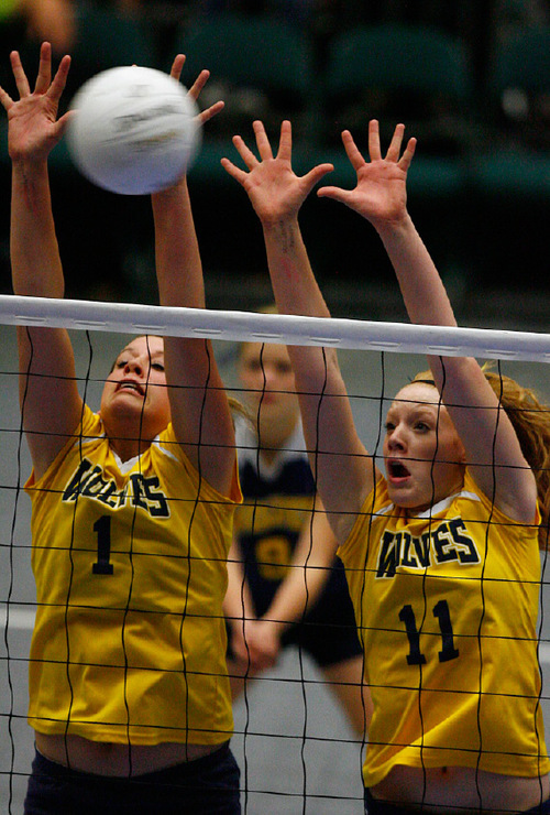 Djamila Grossman  |  The Salt Lake Tribune&#xA;&#xA;Enterprise High School's Anden Lyman, 11, and Riley Hutchings, 1, block the ball in the 2A championship game against San Juan High School at Utah Valley University in Orem, Saturday, October 30, 2010. San Juan won the game.