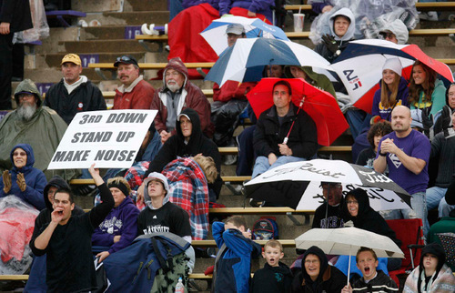 Trent Nelson  |  The Salt Lake Tribune&#xA;Weber State fans sit in the rain during the second half, Weber State vs. Montana, college football Saturday, October 30, 2010.