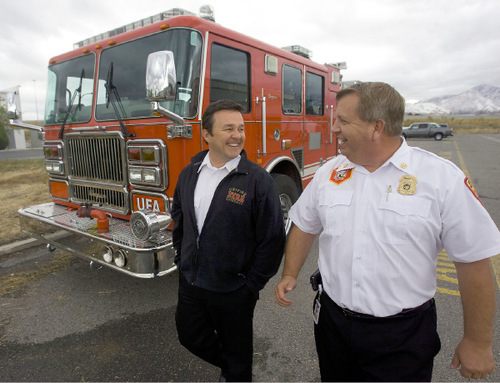 Al Hartmann  |  Salt Lake Tribune&#xA;Unified Fire Authority Chief Michael Jensen, left, and  Deputy Chief Gaylord Scott have had an eventful year at their jobs with Cottonwood Creek flooding earlier this Spring,  this Summer's oil spill and was integral in fighting the Herriman Machine Gun fire.  UFA covers unincorporated Salt Lake County as well as Alta, Draper, Taylorsville, Riverton, Holladay and Herriman making it the largest fire department in the state.