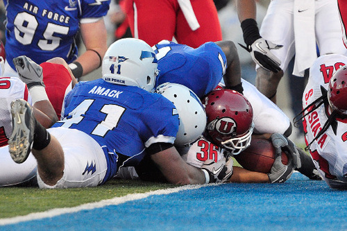 Michael Mangum  |  The Salt Lake Tribune&#xA;&#xA;Utah running back Eddie Wide III (#36) slips in past Falcon defenders for a touchdown during the first half of play against Air Force at Falcon Stadium in Colorado Springs on Saturday, October 30, 2010.