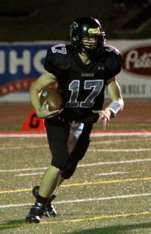 Alta High quarterback Eric Emery finds an opening against Pleasant Grove in Sandy, Utah on Friday night.&#xA;Stephen Holt / Special to the Tribune