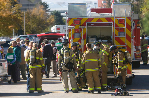 Al Hartmann  |  The Salt Lake Tribune&#xA;Salt Lake City firefighters respond Monday to an underground hot water pipe explosion at 1850 East and 300 South on the University of Utah campus where several construction workers were injured.