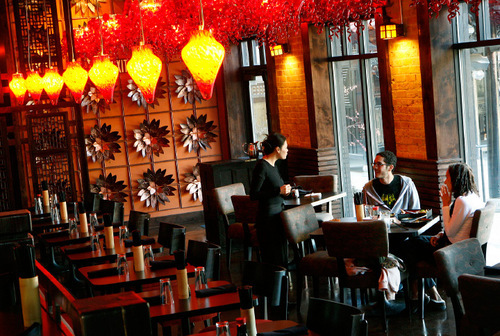 Scott Sommerdorf  |  Salt Lake Tribune
The north wing shown here is where the sushi bar is along with more seating at Sapa, a pan-Asian restaurant on State Street in Salt Lake City. The south wing is a more formal seating arrangement with booths and dramatic Chihuly-like light fixtures.