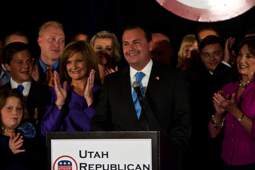 Chris Detrick  |  The Salt Lake Tribune 
Surrounded by family, friends and supporters, Republican Mike Lee speaks at the Salt Lake Hilton Hotel Tuesday November 2, 2010.  Conservative Republican Mike Lee coasted to an easy win Tuesday over Democrat Sam Granato in Utah's Senate race -- shifting Utah's representation in Congress even further to the right, and completing a big victory for the tea party nationally.