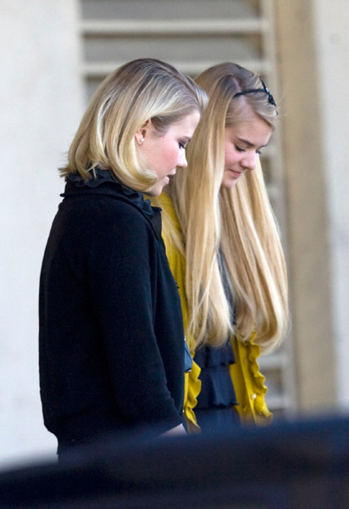 Al Hartmann  |  The Salt Lake Tribune  
Elizabeth Smart, left,  and younger sister Mary Katherine Smart, leave from the back door of Frank Moss Federal Courthouse in Salt Lake City on Thursday, Nov. 4.  The trial against Elizabeth Smart's accused kidnapper Brian David Mitchell was stopped after about two hours.