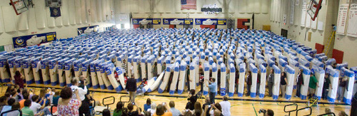 Paul Fraughton  |  The Salt Lake Tribune     Eisenhower Junior High Student Body President, Roxana Martinez falls back into a gym full of students and mattresses to start the  domino chain reaction for the junior high's attempt to break the world record for human/mattress domino chain  on  Wednesday,October 20, 2010