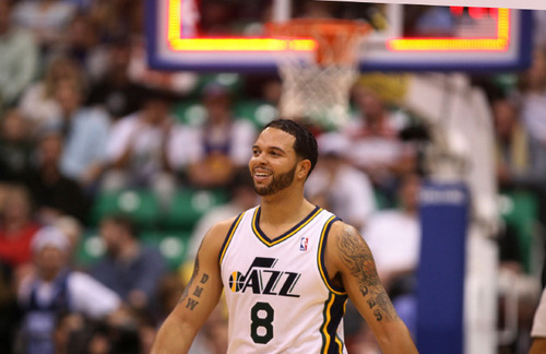 Steve Griffin  |  The Salt Lake Tribune&#xA;&#xA;Utah Jazz guard Deron Williams smiles as he walks off the court at the end of the first half of the Jazz versus Toronto basketball game at EnergySolutions Arena in Salt Lake City Wednesday, November 3, 2010.