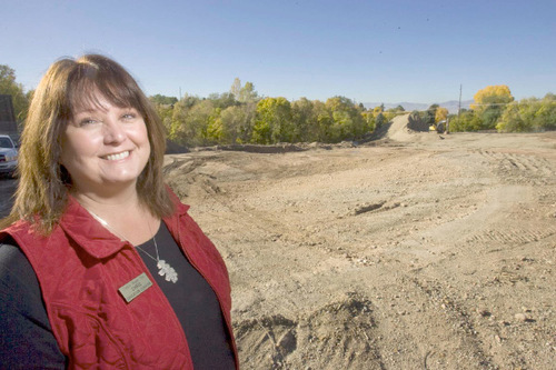 Paul Fraughton  |  The Salt Lake Tribune Chris Schmitz, Hogle Zoo's education coordinator stands in front of a  excavated area that will become the  17 million 