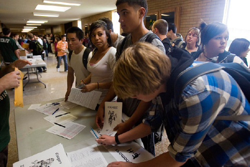 Djamila Grossman  |  The Salt Lake Tribune&#xA;&#xA;Kearns High School students sign up before receiving an iPod Touch at the school in Kearns, Friday, November 5, 2010. The iPods are part of an educational grant the school has received and they will be used in class.